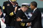 110930-F-RG147-844President Barack Obama congratulates Chairman of the Joint Chiefs of Staff Adm. Mike Mullen, U.S. Navy, during the Chairman of the Joint Chiefs of Staff change of responsibility ceremony at Summerall Field, Joint Base Myer-Henderson Hall, Va., on Sept. 30, 2011. Mullen was succeeded by Army Gen. Martin E. Dempsey as the 18th chairman of the Joint Chiefs of Staff. DoD photo by Tech. Sgt. Jacob N. Bailey, U.S. Air Force. (Released)