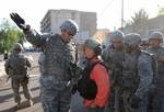 U.S. Army Lt. Gen. Ray Odierno, commander of Multi-National Corps - Iraq, briefs Katie Couric, anchor and managing editor of the CBS Evening News, on security conditions in the Rusafa district of Baghdad, Iraq, Sept. 2, 2007. wnhires