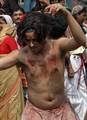 INDIA-MUSLIM-MUHARAM-FESTIVAL Muslim boy flagellate themselves on the eve of Ashura, the death anniversary of Imam Hussein, on January 09 2009 in Kolkata , celebrate the religious festival of Ashura which is commemorated by the Shi'a as a day of remembrance for the martyrdom of Husayn ibn Ali, the grandson of the Islamic prophet Muhammad at the Battle of Karbala. Ashura, meaning the tenth day in Arabic, is the tenth day of Muharam, the first month in the Islamic calendar. The holiday has also be