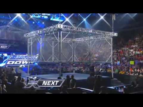 WWE SmackDown 1/15/10 Batista vs Rey Mysterio - Steel Cage Match Part 1/2 HQ