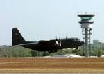 A C-130 Hercules from the 517th Airlift Squadron, Elmendorf Air Force Base, Alaska, takes off for a morning mission to Dili, East Timor.