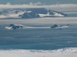 Half Moon Island from Kuzman Knoll, Livingston Island, with Greenwich Island in the background.