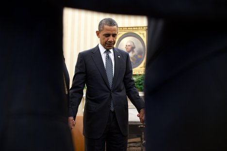 President Barack Obama meets with evangelical leaders on religious liberty in the Oval Office, May 18, 2012.