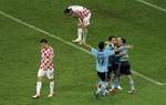 Spain's Jesus Navas celebrates with Spain's Andres Iniesta, Spain's Cesc Fabregas and Spain's Alvaro Arbeloa, from right, after he scored the only goal as Croatia's Ivan Perisic and Croatia's Gordon Schildenfeld, from left, walk away during the Euro 2012 soccer championship Group C match between Croatia and Spain in Gdansk, Poland, Monday, June 18, 2012.