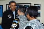 CAMP BONIFAS, Republic of Korea - President Barack Obama shakes hands with Staff Sgt. Naran Singh of the United Nations Command Security Battalion March 25 at the camp dining facility. Singh and dozens of other military personnel from the battalion and United Nations Command Military Armistice Commission met wtih Obama during his visit to the camp and Demilitarized Zone. The President is in Korea to take part in the Nuclear Security Summit in Seoul. Waiting to meet Obama is Spec. Andrea Gillespi