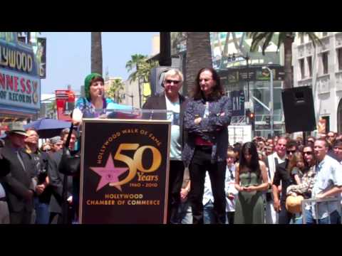 Donna Halper congratulates RUSH on Hollywood Walk of Fame Star