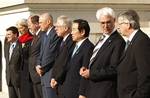 The G7 finance ministers pose for a group photo at the Treasury Department in Washington, Friday, April 11, 2008. Left to right are Canada's James Flaherty, France's Christine Lagarde, Germany's Peer Steinbruk, United States' Henry Paulson, Italy's Tommaso Padoa-Schioppa, Japan's Fukushiro Nukaga, Britian's Alistair Darling and Eurogroup's Jean-Claude Juncker