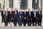 G7 finance ministers (front row) and central bank governors (back row) gather for a group picture during meetings at the U.S. Treasury Department in Washington April 11, 2008. Front row (L-R): Canadian Finance Minister Jim Flaherty, French Finance Minister Christine Lagarde, German Finance Minister Peer Steinbrueck, U.S. Treasury Secretary Henry Paulson, Italy's Finance Minister Tommaso Padoa-Schioppa, Japan's Finance Minister Fukushiro Nukaga, British Chancellor of the Exchequer Alistair Darlin