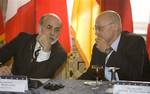 Federal Reserve Chairman Ben Bernanke, left, talks with Treasury Secretary Henry Paulson during the G7 Finance Ministers and Central Bank Governors Ministerial meeting, Friday, Oct. 10, 2008, at the Treasury Department in Washin