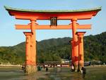 Tori and Itsukushima Shrine in background, Miyajima Island, Hiroshima Prefecture, Japan