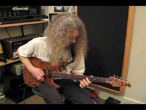 Guthrie Govan playing to Larry Carlton style track