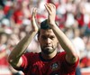 Leverkusen's Michael Ballack says goodbye to his fans after the German first division Bundesliga soccer match Bayer 04 Leverkusen versus Hannover 96 in Leverkusen, Germany, Saturday, April 28, 2012. It was Ballack's last home with Leverkusen.