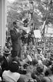 Attorney General Robert F. Kennedy speaking to a Civil Rights crowd in front of the Justice Department building on June 14, 1963.