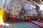 Staff Sgt. Mick Miller, a paratrooper with the 82nd Airborne Division's 1st Brigade Combat Team, searches the compound of a known Taliban commander June 3, 2012, Ghazni Province, Afghanistan. Out of courtesy, soldiers typically remove helmets and eyewear prior to entering Afghan homes. (U.S. Army photo by Sgt. Michael J. MacLeod)