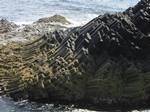 Basalt columns on Am Buchaille.However inspiring the scenery, it was not an easy place to live. In 1772 there was but a single family living on a diet of barley oats, flax and potatoes, and whatever their grazing animals could provide.