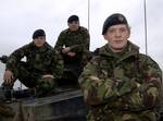 L-R: Trooper Lee Dobbs, Lance Corporal Mark Foley and Second Lieutenant Merlin Hanbury-Tension training at the Castlemartin ranges in Pembrokeshire .