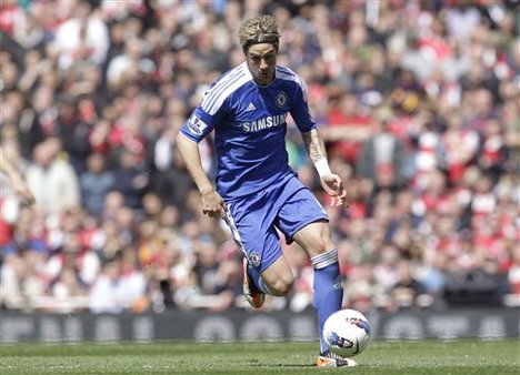 Chelsea's Fernando Torres plays against Arsenal during their English Premier League soccer match at Emirates Stadium, London, Saturday, April 21, 2012.