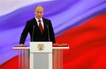 Vladimir Putin takes the oath of office during his inauguration as new Russia's president in the Grand Kremlin Palace in Moscow on Monday, May 7, 2012