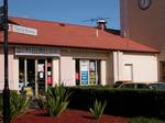 The convenience store next to the Village Green and near the western vehicle entrance, Australia.