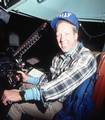 Television celebrity David Hartman sits in the copilot's station of a C-141B Starlifter aircraft that will fly him and his crew to Thule Air Base. Hartman is en route to Thule to film a segment for his television program 