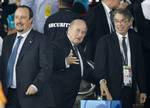 In this picture taken Saturday, Dec. 18, 2010, Inter Milan President Massimo Moratti, right, Inter Milan coach Rafa Benitez of Spain, left, and FIFA President Sepp Blatter, center, during the Club World Cup final soccer match at Zayed sport city in Abu Dhabi, United Arab Emirates. Rafa Benitez's future at Inter Milan appears uncertain amid Italian reports he is on the verge of being replaced as coach. Benitez, who was hired six months ago on a two-year contract to replace Jose Mourinho, has repo