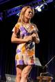 Jeri Ryan on stage at the 2010 Las Vegas Star Trek Convention in Nevada. Jeri Ryan first gained public prominence by being chosen as the winner of the 1989 Miss Illinois state beauty pageant. She graduated from Northwestern University in 1990 with a BA degree in Theatre. Ryan then pursued employment as an actress in Los Angeles and enjoyed her biggest career break when she was chosen to play the role of Seven of Nine, a de-assimilated Borg drone who had been freed from the Borg's collective cons