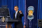 President Barack Obama introduced two added energy programs to the American Recovery and Reinvestment Act of 2009 to more than 450 military and civilian members at the Thunderbird Hanger at Nellis Air Force Base, Nev., May 27. Prior to his speech, President Obama visited Nellis' photovoltaic array, the largest solar energy farm in the Western Hemisphere. The PVA has more than 72,000 solar panels, which save the base about $1 million a year in energy costs.