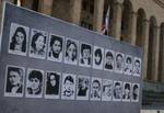 Photos of the April 9, 1989 Massacre victims (mostly young women) on billboard in Tbilisi. On 7 April 1989 troops and armored personnel carriers were sent onto the streets of Tbilisi after more than 100,000 people gathered in front of the Government and Communist Party headquarters