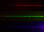 Laser beams (red, green, violet).Vertical cavity surface-emitting lasers (VCSELs) are semiconductor lasers whose emission direction is perpendicular to the surface of the wafer.