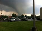 Tornado in Springfield rips through a neighborhood behind an office building. Date 1 June 2011