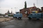 Indian paramilitary soldiers stand guard during undeclared curfew in downtown area in Srinagar , the summer capital of Indian Kashmir, 13 July 2012.Authorities Friday clamped severe restrictions in Srinagar city, the region's summer capital to thwart the separatist march on the eve of Martyrs' day in Indian Kashmir.The restrictions were enforced by contingents of Indian police and paramilitary troopers of India�s Central Reserve Police Force (CRPF) deployed across the city. July 13 in Indian Kas