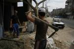 Palestinian workers working in Gaza City. -- Central of Statistics said that the rate of unemployment in the Palestinian territories, in 15 years individuals involved in the labor force was over 21%. About 222 thousand are unemployed, of whom 19% are males and 28% are females.. Photo By Ahmed DEEB/WN