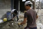 Palestinian workers working in Gaza City. -- Central of Statistics said that the rate of unemployment in the Palestinian territories, in 15 years individuals involved in the labor force was over 21%. About 222 thousand are unemployed, of whom 19% are males and 28% are females.. Photo By Ahmed DEEB/WN