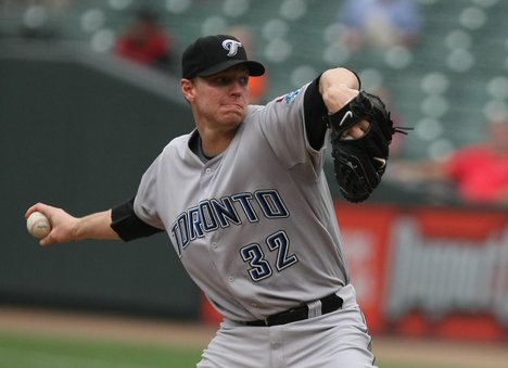 Roy Halladay signed a three-year extension after being traded to Philadelphia.