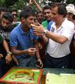 Mohun Bagan Football Player Nahim Nabi offer the cake to New Coach Santosh Kashyap at Mohun Bagan Football Ground on the first day in Kolkata on Tuesday 11 July 2012