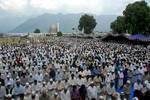 Kashmiri Muslims offer prayers at Kashmir's main Hazratbal Shrine in Srinagar on June 22, 2012, during the last Friday of celebrations for Miraj-Ul-Alam (Ascension to Heaven). Thousands of Muslims converge annually for celebrations at the shrine near the summer capital of the state of Jammu and Kashmir.