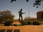 Buddy Holly statue on the Lubbock Walk of Fame. Holly set the template for the standard rock and roll band: two guitars, bass, and drums.[3] He was also one of the first in the genre to write, produce, and perform his own songs. Contrary to popular belief, teenagers John Lennon and Paul McCartney did not attend a Holly concert, although they watched his TV appearance on Sunday Night at the London Palladium;