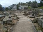 A Roman road paved with blocks of stone ran from north to south through the center of Glanum. Under the street was a water conduit which carried away rainwater and sewage.