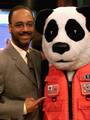 NEW YORK, New York (May 25)--PFD Panda made his appearance on ABC's Good morning America and snuck a photo with weatherman Tony Perkins. PFD Panda visited sites throughout the New York area during National Safe Boating Week. His appearance is all part of the First Coast Guard District Operation Boat Smart efforts. USCG photo by PA3 Tom Sperduto (117072) ( PFD PANDA AND TONY PERKINS (FOR RELEASE) )