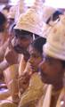 Brides and grooms sit during a mass marriage ceremony on 123 Couples who will be tying the knot out on 1st July 2012 at Haldiram Banquets organisational by Vishwa Jagriti Mission Trust in Kolkata on Sunday 1st July 2012