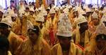 Brides and grooms sit during a mass marriage ceremony on 123 Couples who will be tying the knot out on 1st July 2012 at Haldiram Banquets organisational by Vishwa Jagriti Mission Trust in Kolkata on Sunday 1st July 2012