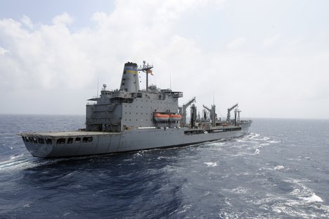 File - The Military Sealift Command fleet replenishment oiler USNS Rappahannock awaits the U.S. 7th Fleet flagship USS Blue Ridge, not shown, to come alongside for a replenishment at sea.