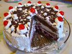 A Schwarzwälder Kirsch torte (Black Forest cake).German cuisine varies from region to region. The southern regions of Bavaria and Swabia, for instance, share a culinary culture with Switzerland and Austria.