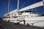 A closer view of Athena. Athena is a clipper-bowed three masted gaff rigged schooner built by Royal Huisman in 2004 for Internet entrepreneur James H. Clark. Clark purchased a 47.4 meter sloop, Hyperion, from Royal Huisman in 1998.