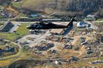 A U.S. Army UH-60 Black Hawk helicopter carries Kentucky Gov. Steve Beshear as he views damage in West Liberty, Ky., March 3, 2012, after a tornado hit the town the previous day. Approximately 220 Kentucky National Guardsmen assisted post-weather efforts in five counties in eastern Kentucky as a result of tornados that struck the area. (U.S. Army photo by Capt. Stephen Martin/Released)