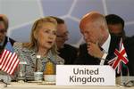 U. S. Secretary of State Hillary Rodham Clinton, left, and United Kingdom's Foreign Secretary William Hague speak during a meeting of Libya Contact Group in Istanbul, Turkey, Friday, July 15, 2011. Delegates from nearly 40 countries seeking an end to the Libyan conflict met in Istanbul on Friday to discuss more financial aid and diplomatic support to Libya's main opposition group as the rebels struggled to defeat Gadhafi-loyal forces. Senior U.S. officials have said the Obama administration is p