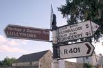 Old style Finger post with old Link Road number on it. The Republic of Ireland had a different road numbering system prior to the introduction of the National Route numbering system.