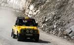 Racing cars zoom on the Mughal Road connecting kashmir valley some border districts of Jammu region on Sunday 01, July 2012. As the three day third Mughal Road Car Rally began with 93 teams including Kashmir's first motorsport team, Baba Reshi Lions, vying for top honours The three-day mega event, organised by Shimla-based Himalayan Motor Sport Association in coordination with State Tourism Department, The 600-kilometre long rally passes through the historic Mughal road that was once traversed b