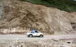 Racing cars zoom on the Mughal Road connecting kashmir valley some border districts of Jammu region on Sunday 01, July 2012. As the three day third Mughal Road Car Rally began with 93 teams including Kashmir's first motorsport team, Baba Reshi Lions, vying for top honours The three-day mega event, organised by Shimla-based Himalayan Motor Sport Association in coordination with State Tourism Department, The 600-kilometre long rally passes through the historic Mughal road that was once traversed b