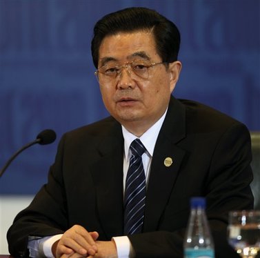 China's President Hu Jintao attends the BRIC summit at the Itamaraty palace in Brasilia, Thursday, April 15, 2010